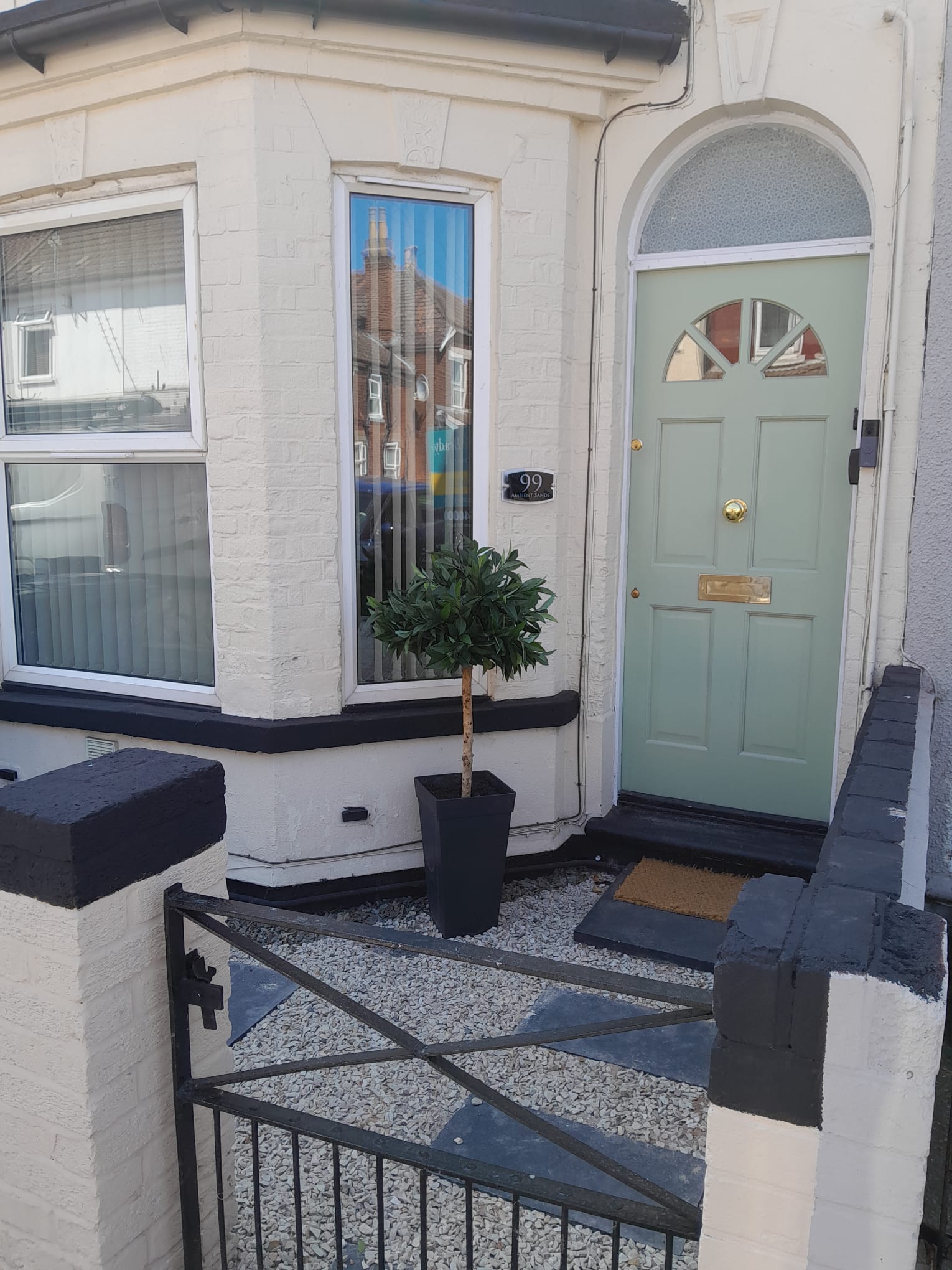 Victorian front door and gated entrance to Ambient Sands