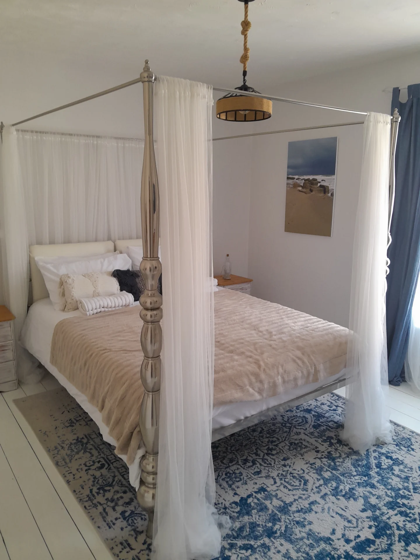 Serene coastal-inspired bedroom at Ambient Sands